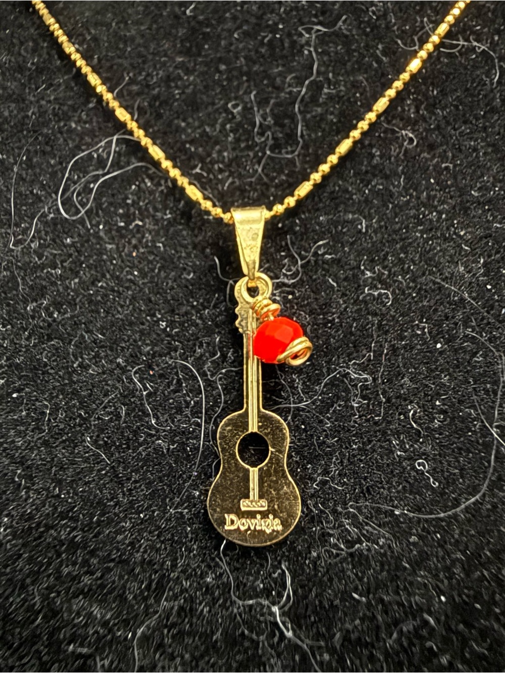 Gold Guitar Pendant Necklace with Red Accent Bead